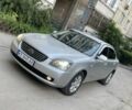 Серый Киа Маджентис, объемом двигателя 2 л и пробегом 250 тыс. км за 3950 $, фото 1 на Automoto.ua
