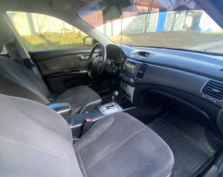 Сірий Кіа Маджентіс, об'ємом двигуна 2 л та пробігом 303 тис. км за 4700 $, фото 28 на Automoto.ua