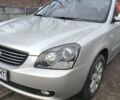 Сірий Кіа Маджентіс, об'ємом двигуна 2 л та пробігом 245 тис. км за 5700 $, фото 1 на Automoto.ua