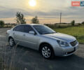 Сірий Кіа Маджентіс, об'ємом двигуна 2 л та пробігом 223 тис. км за 5600 $, фото 1 на Automoto.ua