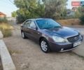Серый Киа Маджентис, объемом двигателя 2 л и пробегом 145 тыс. км за 6300 $, фото 1 на Automoto.ua