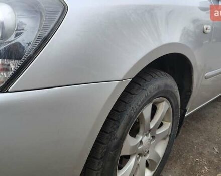 Сірий Кіа Маджентіс, об'ємом двигуна 2 л та пробігом 245 тис. км за 5700 $, фото 1 на Automoto.ua