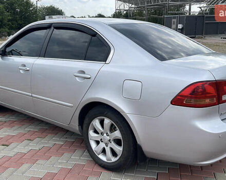 Сірий Кіа Маджентіс, об'ємом двигуна 2 л та пробігом 303 тис. км за 6500 $, фото 3 на Automoto.ua