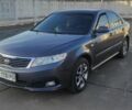 Сірий Кіа Маджентіс, об'ємом двигуна 2 л та пробігом 255 тис. км за 6800 $, фото 1 на Automoto.ua