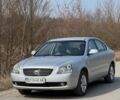 Сірий Кіа Маджентіс, об'ємом двигуна 2 л та пробігом 245 тис. км за 5700 $, фото 1 на Automoto.ua