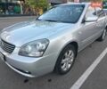 Сірий Кіа Маджентіс, об'ємом двигуна 2 л та пробігом 257 тис. км за 4000 $, фото 1 на Automoto.ua