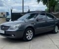 Сірий Кіа Маджентіс, об'ємом двигуна 2 л та пробігом 221 тис. км за 4990 $, фото 1 на Automoto.ua