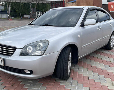 Сірий Кіа Маджентіс, об'ємом двигуна 2 л та пробігом 303 тис. км за 6500 $, фото 4 на Automoto.ua
