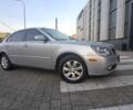 Серый Киа Маджентис, объемом двигателя 2 л и пробегом 325 тыс. км за 5400 $, фото 1 на Automoto.ua