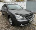 Серый Киа Маджентис, объемом двигателя 2 л и пробегом 228 тыс. км за 5400 $, фото 16 на Automoto.ua