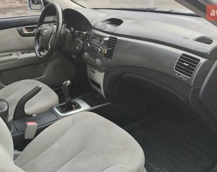 Сірий Кіа Маджентіс, об'ємом двигуна 2 л та пробігом 245 тис. км за 5700 $, фото 20 на Automoto.ua