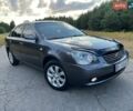 Сірий Кіа Маджентіс, об'ємом двигуна 2 л та пробігом 233 тис. км за 5700 $, фото 1 на Automoto.ua