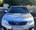 Сірий Кіа Маджентіс, об'ємом двигуна 2 л та пробігом 219 тис. км за 7000 $, фото 1 на Automoto.ua