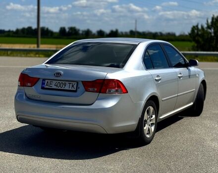 Сірий Кіа Маджентіс, об'ємом двигуна 2 л та пробігом 208 тис. км за 7200 $, фото 5 на Automoto.ua