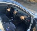 Серый Киа Маджентис, объемом двигателя 2 л и пробегом 316 тыс. км за 6000 $, фото 3 на Automoto.ua