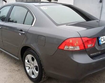 Сірий Кіа Маджентіс, об'ємом двигуна 2 л та пробігом 191 тис. км за 7700 $, фото 4 на Automoto.ua