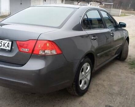 Сірий Кіа Маджентіс, об'ємом двигуна 2 л та пробігом 191 тис. км за 7700 $, фото 3 на Automoto.ua