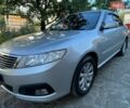 Сірий Кіа Маджентіс, об'ємом двигуна 2 л та пробігом 220 тис. км за 6500 $, фото 1 на Automoto.ua