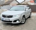 Серый Киа Маджентис, объемом двигателя 2 л и пробегом 211 тыс. км за 5950 $, фото 1 на Automoto.ua