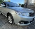 Сірий Кіа Маджентіс, об'ємом двигуна 2 л та пробігом 220 тис. км за 6492 $, фото 1 на Automoto.ua
