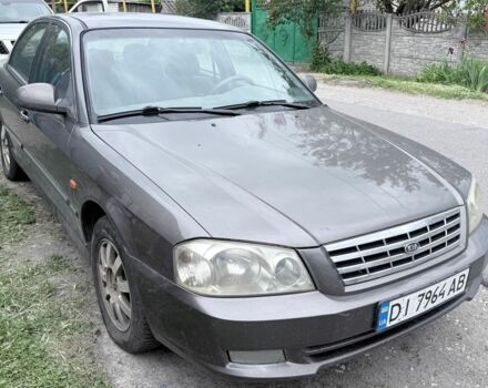 Серый Киа Маджентис, объемом двигателя 2 л и пробегом 346 тыс. км за 2400 $, фото 1 на Automoto.ua