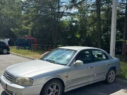 Серый Киа Маджентис, объемом двигателя 2.5 л и пробегом 335 тыс. км за 1800 $, фото 1 на Automoto.ua