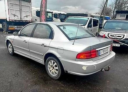 Серый Киа Маджентис, объемом двигателя 2 л и пробегом 290 тыс. км за 2700 $, фото 1 на Automoto.ua