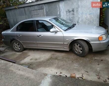 Сірий Кіа Маджентіс, об'ємом двигуна 2 л та пробігом 271 тис. км за 3200 $, фото 1 на Automoto.ua