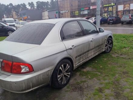 Серый Киа Маджентис, объемом двигателя 2 л и пробегом 250 тыс. км за 3000 $, фото 1 на Automoto.ua