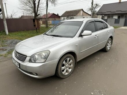 Сірий Кіа Маджентіс, об'ємом двигуна 2 л та пробігом 176 тис. км за 3900 $, фото 1 на Automoto.ua