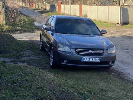 Сірий Кіа Маджентіс, об'ємом двигуна 2 л та пробігом 303 тис. км за 4700 $, фото 1 на Automoto.ua