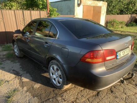 Серый Киа Маджентис, объемом двигателя 2 л и пробегом 250 тыс. км за 5800 $, фото 1 на Automoto.ua