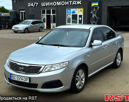 Сірий Кіа Маджентіс, об'ємом двигуна 2 л та пробігом 220 тис. км за 5650 $, фото 1 на Automoto.ua