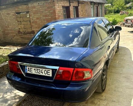 Синій Кіа Маджентіс, об'ємом двигуна 2 л та пробігом 380 тис. км за 2600 $, фото 3 на Automoto.ua