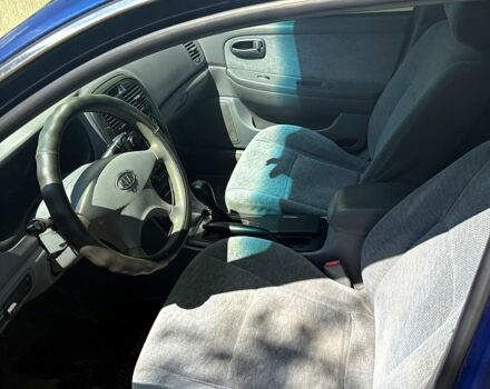 Синій Кіа Маджентіс, об'ємом двигуна 2 л та пробігом 380 тис. км за 2600 $, фото 4 на Automoto.ua