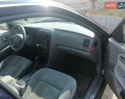 Синий Киа Маджентис, объемом двигателя 1.98 л и пробегом 198 тыс. км за 3000 $, фото 6 на Automoto.ua