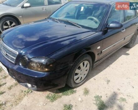 Синий Киа Маджентис, объемом двигателя 1.98 л и пробегом 198 тыс. км за 3000 $, фото 2 на Automoto.ua