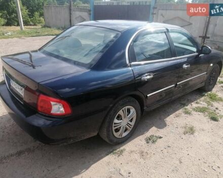 Синий Киа Маджентис, объемом двигателя 1.98 л и пробегом 198 тыс. км за 3000 $, фото 5 на Automoto.ua