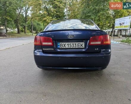 Синій Кіа Маджентіс, об'ємом двигуна 2 л та пробігом 259 тис. км за 3600 $, фото 5 на Automoto.ua