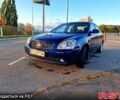 Синій Кіа Маджентіс, об'ємом двигуна 2 л та пробігом 316 тис. км за 4500 $, фото 1 на Automoto.ua