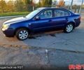 Синій Кіа Маджентіс, об'ємом двигуна 2 л та пробігом 316 тис. км за 4500 $, фото 1 на Automoto.ua