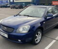 Синій Кіа Маджентіс, об'ємом двигуна 2 л та пробігом 249 тис. км за 5750 $, фото 2 на Automoto.ua