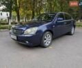 Синій Кіа Маджентіс, об'ємом двигуна 2 л та пробігом 259 тис. км за 3600 $, фото 8 на Automoto.ua