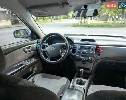Синій Кіа Маджентіс, об'ємом двигуна 2 л та пробігом 259 тис. км за 3600 $, фото 22 на Automoto.ua
