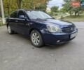 Синій Кіа Маджентіс, об'ємом двигуна 2 л та пробігом 259 тис. км за 3600 $, фото 2 на Automoto.ua