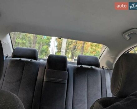 Синій Кіа Маджентіс, об'ємом двигуна 2 л та пробігом 259 тис. км за 3600 $, фото 26 на Automoto.ua