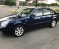 Синій Кіа Маджентіс, об'ємом двигуна 2 л та пробігом 107 тис. км за 6500 $, фото 4 на Automoto.ua