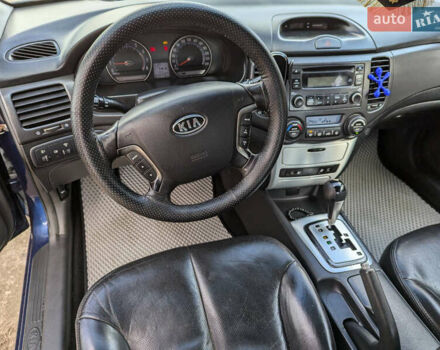 Синий Киа Маджентис, объемом двигателя 2 л и пробегом 220 тыс. км за 4500 $, фото 2 на Automoto.ua