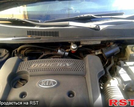 Синий Киа Маджентис, объемом двигателя 2 л и пробегом 373 тыс. км за 5700 $, фото 4 на Automoto.ua