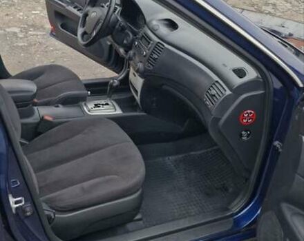 Синій Кіа Маджентіс, об'ємом двигуна 2 л та пробігом 110 тис. км за 5700 $, фото 6 на Automoto.ua